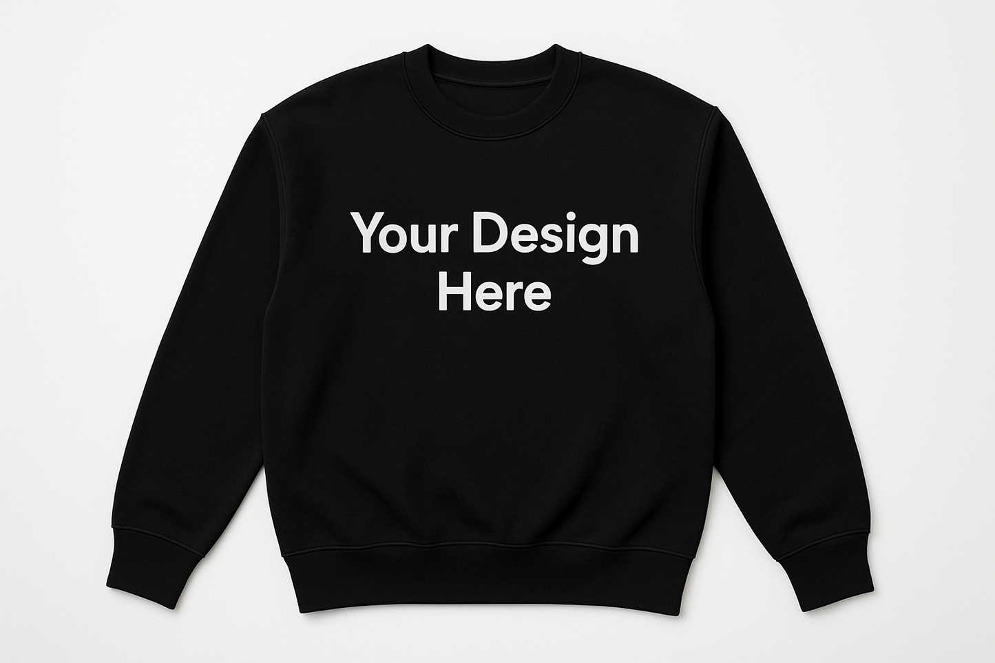 On a plain black crewneck, add text : Your Design Here 
Unisex T-shirt, crewneck, and hoodie featuring a large centered full-color DTF printed design. Available in multiple sizes and colors from Sharp Stitch in Niles, IL.