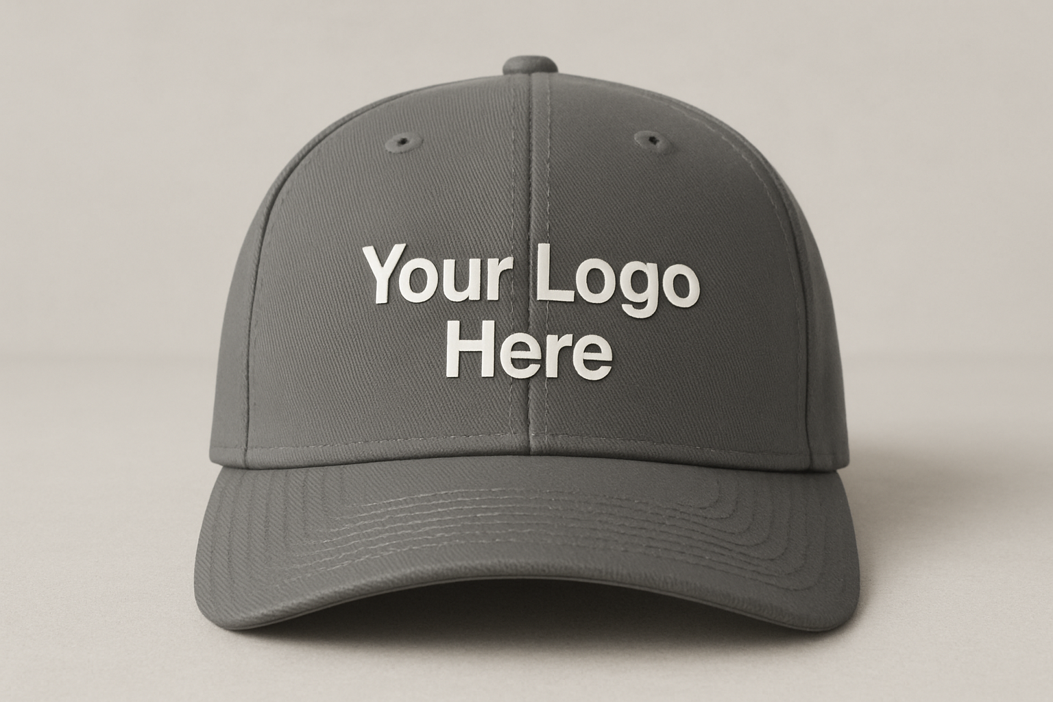 Grey baseball cap, facing forward, with the text: "Your Logo Here" on the cap