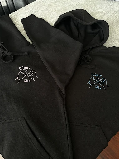 Example showing two personalized embroidered hoodies. Each item sold individually. Bulk and nationwide shipping available.