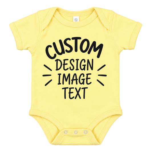 A pale yellow short-sleeve baby bodysuit with black text reading 'CUSTOM DESIGN IMAGE TEXT' printed on the front, shown on a plain white background.