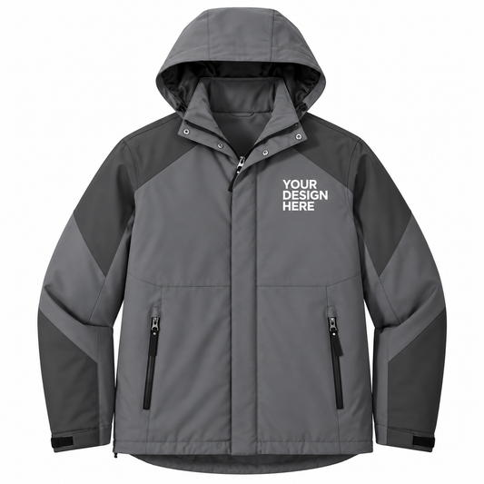 A gray hooded jacket with dark gray panels on the sleeves and shoulders, featuring a front zipper, zippered hand pockets, and white placeholder text on the left chest reading 'YOUR DESIGN HERE'.