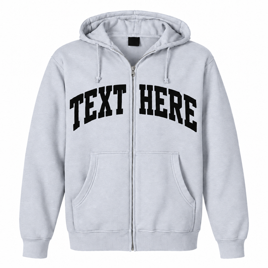 A light gray zip-up hoodie with 'TEXT HERE' printed in black arched block letters across the chest, shown on a plain white background.