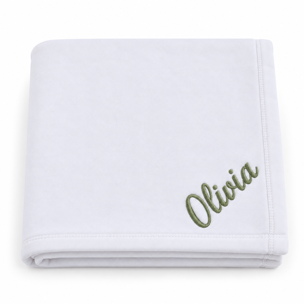 A folded white baby blanket with the name 'Olivia' embroidered in olive green script in the bottom right corner, set against a plain white background.