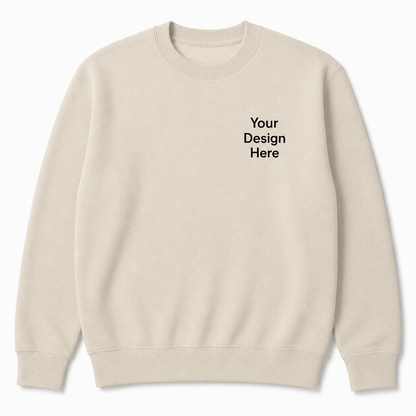 Beige crewneck sweatshirt featuring a left chest design placeholder. A clean, modern option for embroidered logos, boutique apparel, personalized gifts, and company branding.