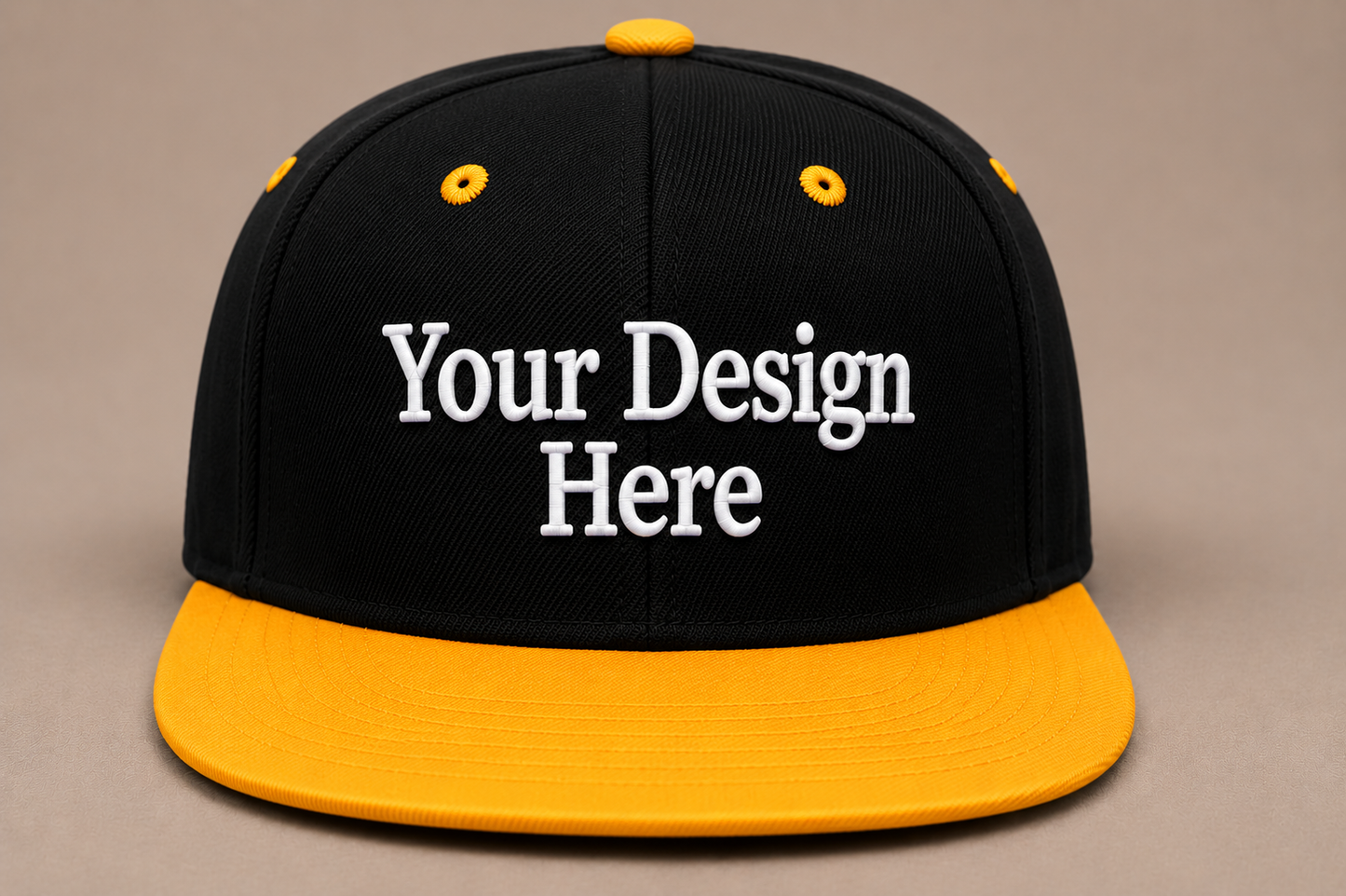 Black crown and yellow visor snapback embroidered with custom logos for a bold branded look.