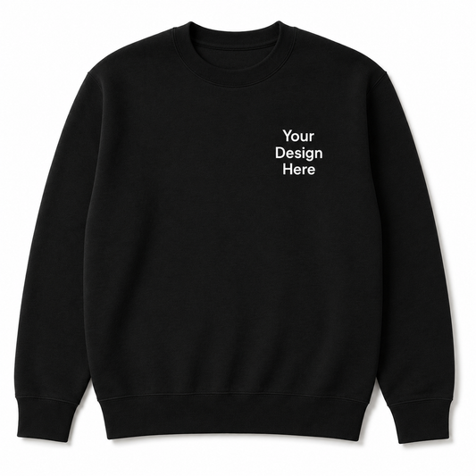 Black Gildan crewneck sweatshirt featuring a left chest "Your Design Here" placeholder. Ideal for custom embroidery, business logos, uniforms, schools, sports teams, and personalized apparel by Sharp Stitch.