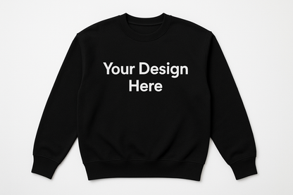 On a plain black crewneck, add text : Your Design Here 
Unisex T-shirt, crewneck, and hoodie featuring a large centered full-color DTF printed design. Available in multiple sizes and colors from Sharp Stitch in Niles, IL.