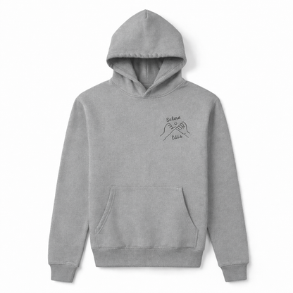 Grey personalized couples hoodie with custom name embroidery on chest. Professional embroidery by Sharp Stitch in Illinois. Shipping nationwide across the USA.