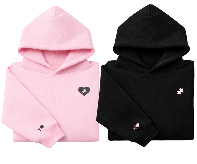 Example of two custom embroidered couples hoodies showing heart with missing puzzle piece and matching puzzle piece design. Optional sleeve initial embroidery available. Professional embroidery by Sharp Stitch in Illinois with nationwide shipping.