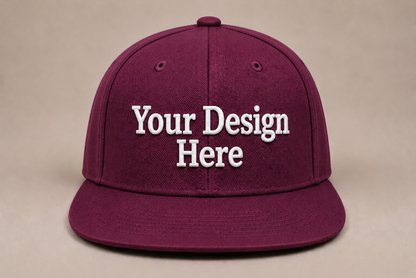Deep wine-colored snapback featuring custom embroidery for premium branded apparel and uniforms.