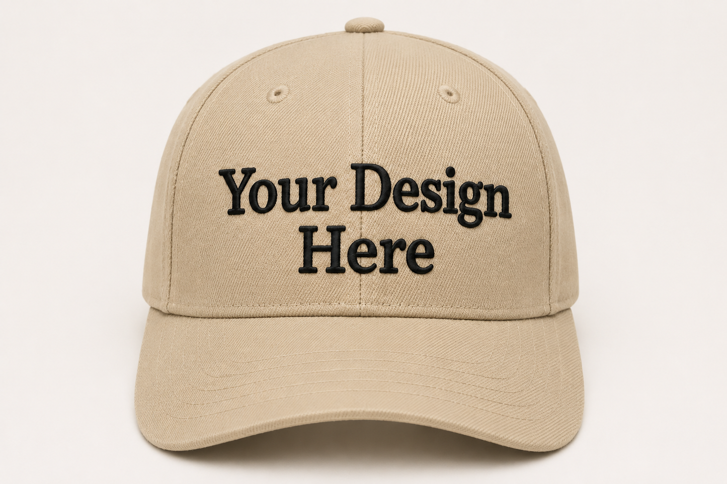 Beige cap with 'Your Design Here' text on a beige background