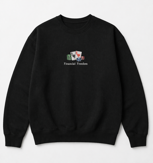 Black crewneck sweatshirt featuring a small center chest embroidery of playing cards, poker chips, and the text Financial Freedom in a minimalist design