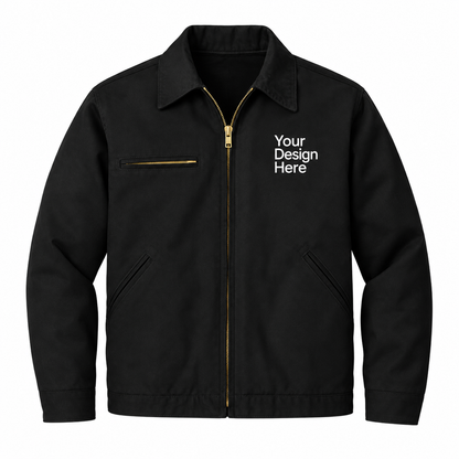 A black zip-up work jacket with gold-tone zipper details, a pointed collar, and white placeholder text on the left chest reading 'Your Design Here'.

