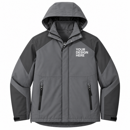 A gray hooded jacket with dark gray panels on the sleeves and shoulders, featuring a front zipper, zippered hand pockets, and white placeholder text on the left chest reading 'YOUR DESIGN HERE'.


