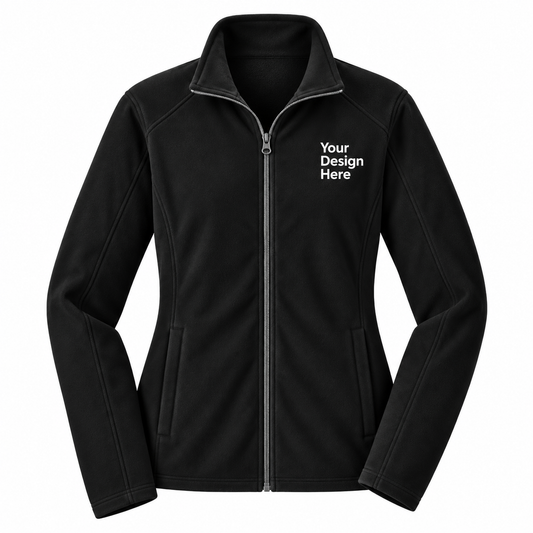 A black zip-up fleece jacket with a stand collar, shown on a plain white background. The right chest area features white placeholder text reading 'Your Design Here', indicating a customizable product.

