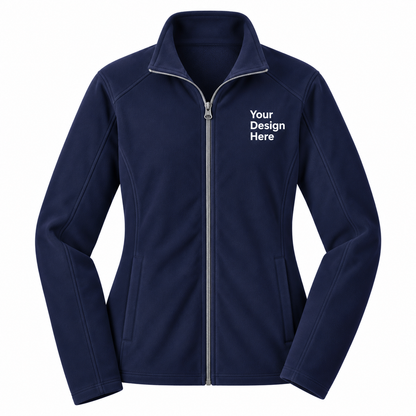 A navy blue zip-up fleece jacket with a mock neck collar, shown on a plain white background. The right chest area features white placeholder text reading 'Your Design Here' indicating a customizable print-on-demand product.

