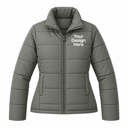 A gray puffer jacket with a mock neck, full zipper, and horizontal quilting. The left chest features white placeholder text reading 'Your Design Here'.

