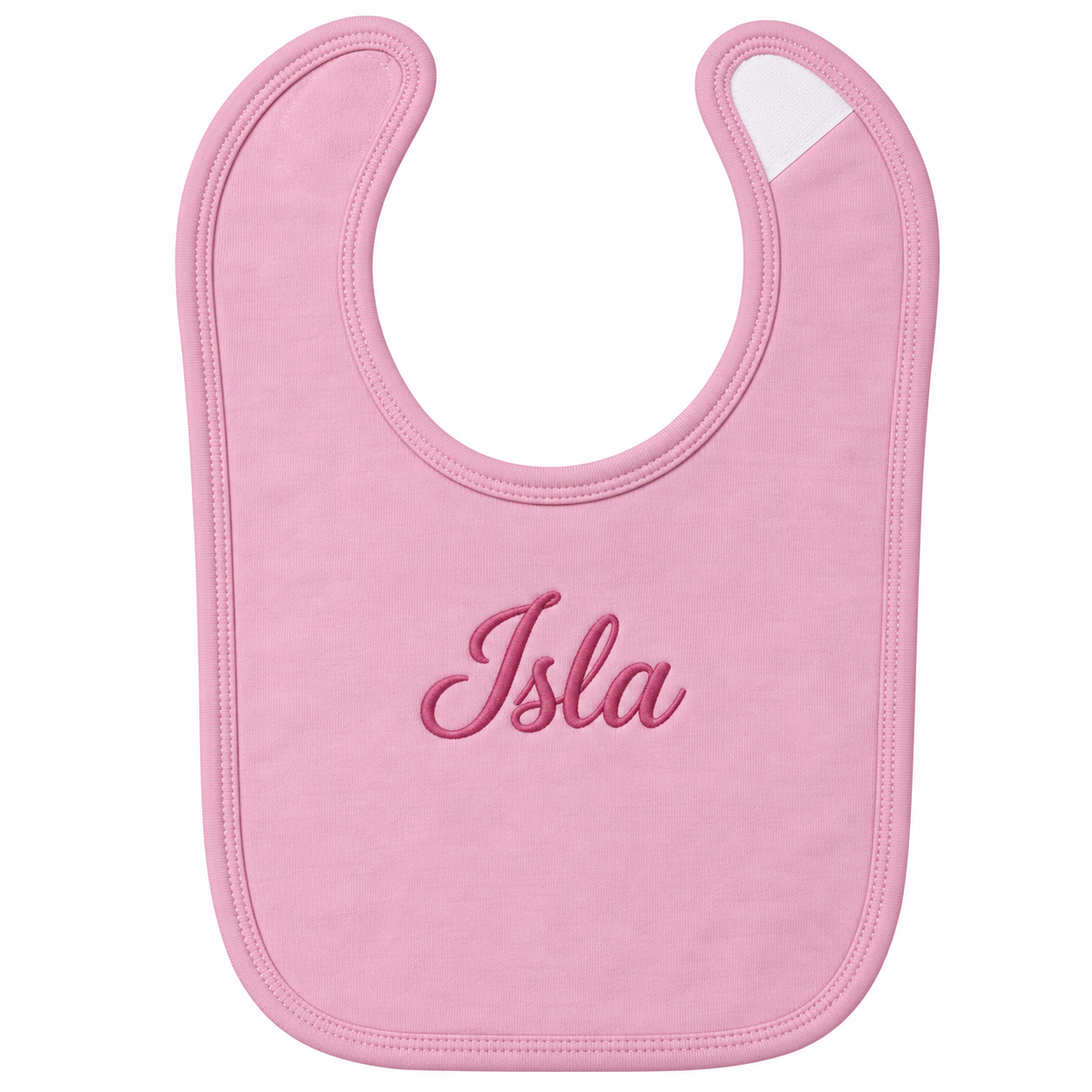 A light pink baby bib with the name 'Isla' embroidered in dark pink script across the center, shown on a plain white background.

