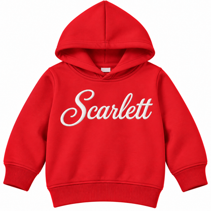 A bright red children's pullover hoodie with the name 'Scarlett' printed across the chest in white cursive script, shown against a plain white background.


